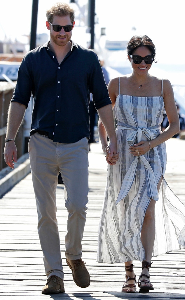 Meghan Markle Cradles Her Baby Bump on a Stroll With Prince Harry